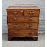 A George III mahogany chest of two short and three long graduated drawers, on bracket feet,