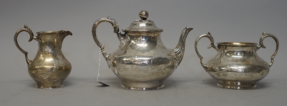 A Victorian silver three piece tea set, comprising; teapot, sugar bowl and milk jug,