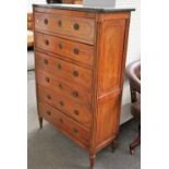 A Louis XVI provincial walnut chest, of six long drawers with harewood stringing,