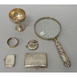 Silver and silver mounted wares, comprising; an Edwardian circular vesta case, Chester 1909,