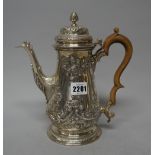A late George II silver coffee pot, of baluster form, with floral,