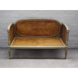 A 19th century and later green painted French small sofa,