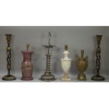 A pair of Kashmiri foliate painted wooden candlesticks with open barley twist stems, 51cm high,