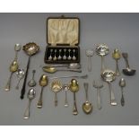 Silver and foreign flatware, comprising; a George III toddy ladle with turned wooden handle,