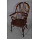 A Victorian ash and elm stickback open armchair.