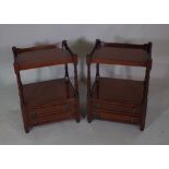 A pair of 20th century mahogany two drawer occasional tables with galleried top,