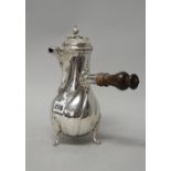 A European silver coffee pot of baluster form,