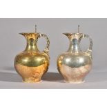 Two Victorian silver water jugs, William And George Sissons, London, 1875 and 1876,