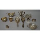 Silver, silver mounted and plated wares, comprising; a seven bar toastrack, of curved form,