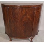 A George II style mahogany bowfront side cabinet on shell capped tapering pad supports 107cm wide x