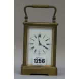 A French brass cased carriage clock, late 19th century, with visible platform escapement,