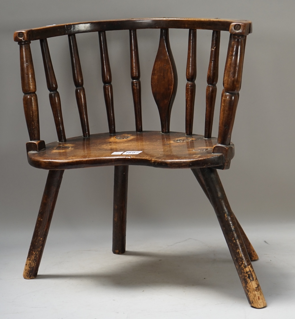 A 19th century primitive beech and ash child's tub back chair with turned decoration,
