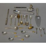 Assorted flatware including two Georgian table spoons, tea spoons, baleen handled toddy lifter,