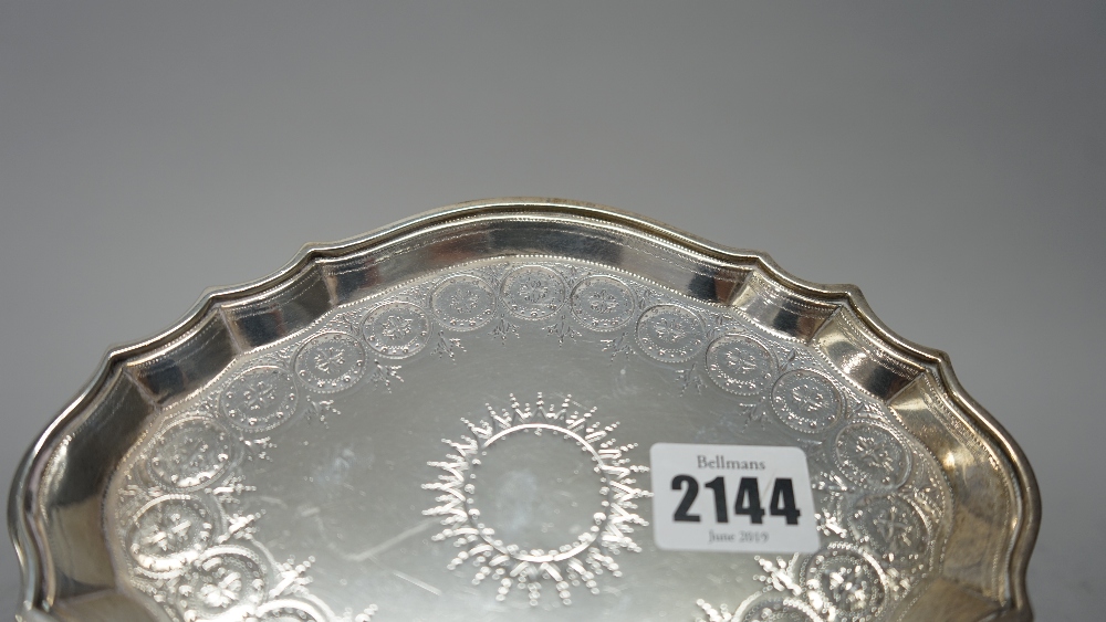 A George III silver teapot stand, of shaped oval form, with bright cut engraved decoration, - Image 4 of 7