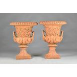 A pair of terracotta jardinières,