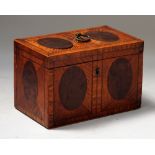 A George III satinwood and yew wood rectangular tea caddy, with twin compartment interior,