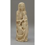 A French 18th century ivory figure group depicting Madonna and Child, 20cm high.