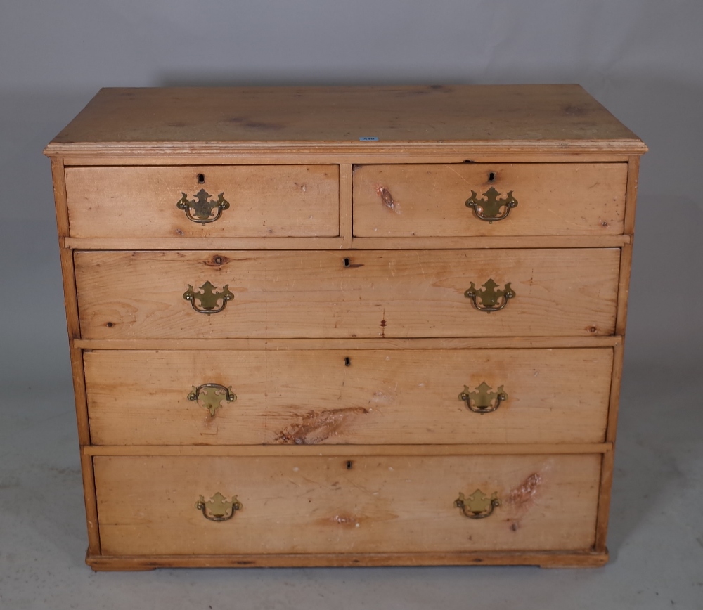 An early 20th century pine chest of two short and three long drawers, 100cm wide x 85cm high.