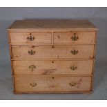 An early 20th century pine chest of two short and three long drawers, 100cm wide x 85cm high.