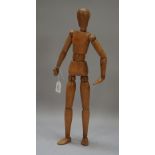 A mid-20th century artist's beech lay figure with articulated joints, 41cm.