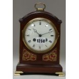 An Edwardian mahogany cased mantel clock, George III style, with domed top,