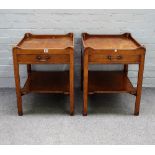 A 20th Century pair of mahogany bedside tables,