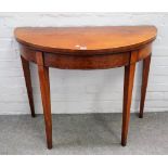 A George III satinwood semi-elliptic card table on tapering square supports, 94cm wide x 76cm high.