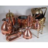 A large quantity of mostly early 20th century brass and copper wares, including jugs, urns,