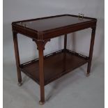 A George III style mahogany two tier serving trolley, 85cm wide x 78cm high.