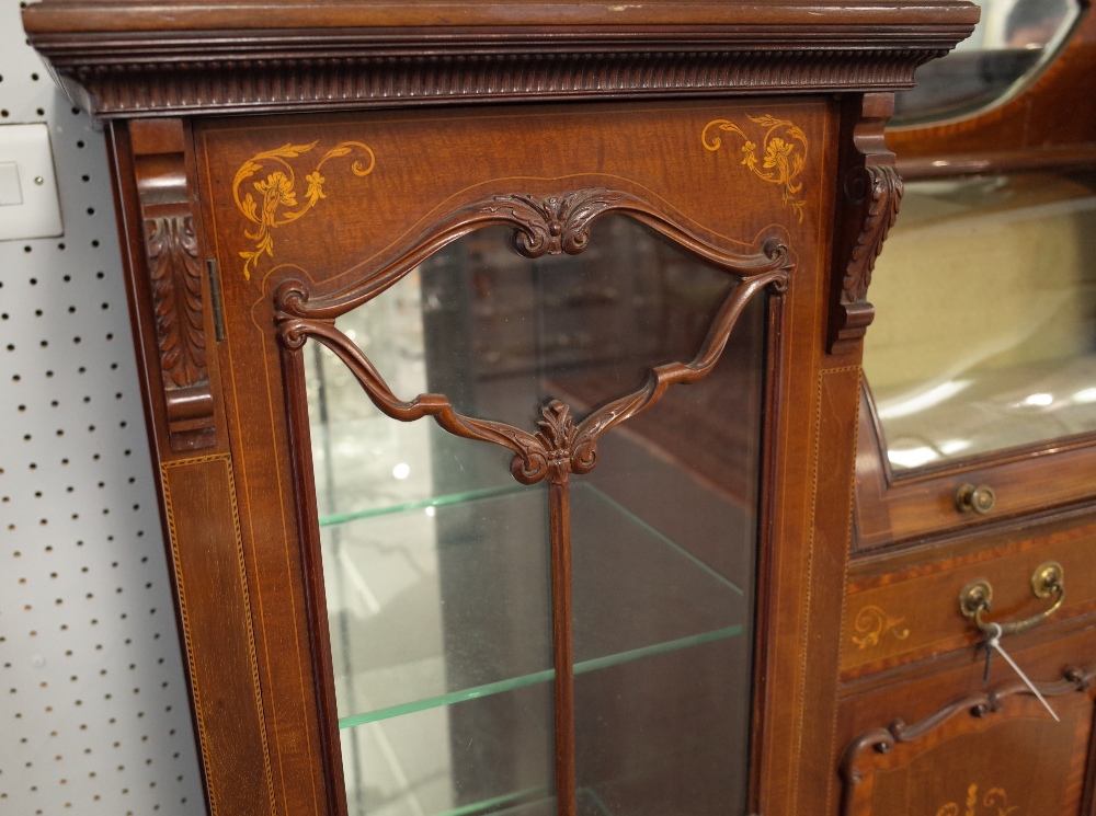 An Edwardian inlaid mahogany mirrored back display cabinet with bowed central compartment over - Image 4 of 8