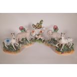 A group of 19th and 20th century Staffordshire figures formed as sheep and zebras, (5).