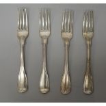 A set of four George III Irish silver fiddle and thread pattern table forks,