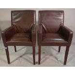 A set of six 20th century faux brown leather armchairs, on tapering supports, (6).