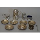 Silver and foreign wares, comprising; a muffineer of cylindrical form with a scroll handle,