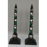 A pair of Victorian black and foliate inlaid marble obelisks, on stepped square plinths, 44cm high,