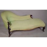 A Victorian mahogany framed spoonback chaise lounge of serpentine outline, 185cm wide x 75cm high.