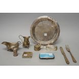 Silver and silver mounted wares, comprising; a cream jug, a sauceboat, a mustard pot,