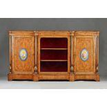 A Victorian gilt metal mounted figured walnut credenza,