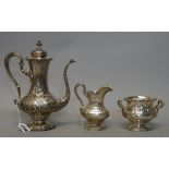An American silver three piece tea set, Hardy & Hayes, marked 1902 Sterling 925, comprising teapot,