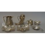 Small silver including; a Victorian parcel gilt cream jug, Hunt & Roskell London 1868, 11.