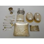 Silver and silver mounted wares, comprising; a pair of oval hairbrushes, Birmingham 1921,