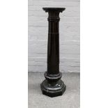 A 19th century carved serpentine column with turned body and octagonal base, 113cm high.