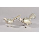 Two late 19th/early 20th century Continental silver novelty pepperettes, marks indistinct,