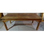 A 20th century Indian hardwood rectangular dining table, on turned supports, 200cm long x 80cm high.