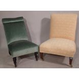 An early 20th century mahogany framed low chair and another similar, (2).