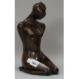Ulwen; a modern patinated bronze, abstract, female nude, modelled kneeling, hands behind her back,