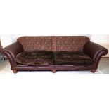 Tetrad Eastwood; a 20th century hardwood framed four seater sofa with leather