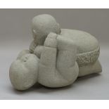 A modern stone figural group depicting two Chinese wrestlers, signed 'SOMCAIAT' 34cm wide.