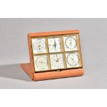 A vintage Angelus sixsome eight day desk top clock compendium comprising; barometer, compass,
