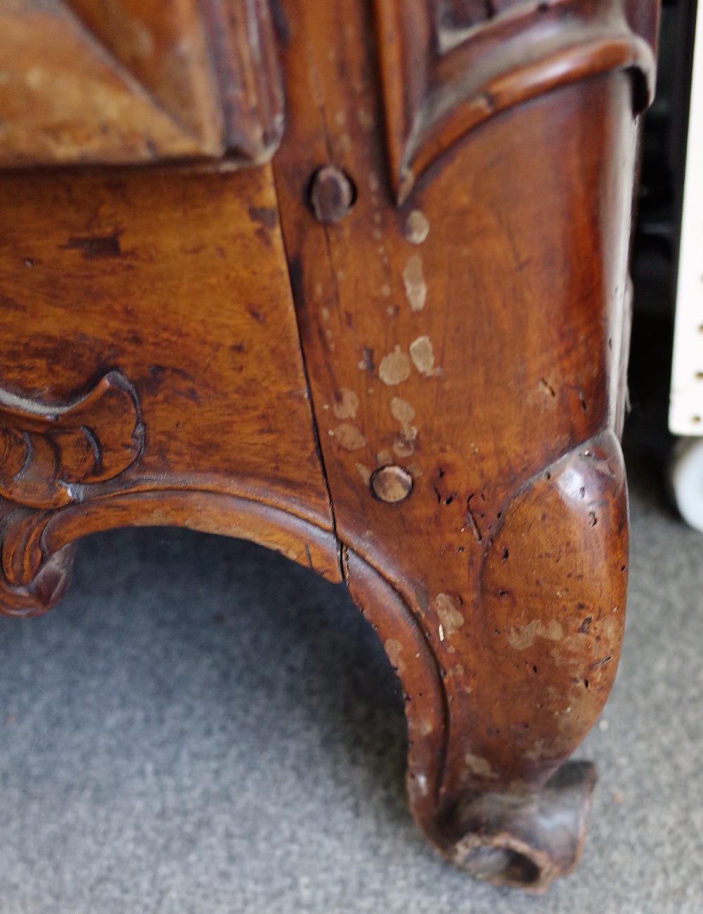 An 18th century fruitwood armoire with carved arched cornice over a pair of shaped panel doors, - Image 6 of 7